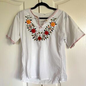 White cotton blouse lace up front embroidered floral pattern size Large